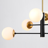 Designad pendellampa Damian med sex lampor och glaskulor