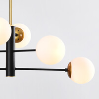 Designad pendellampa Damian med sex lampor och glaskulor