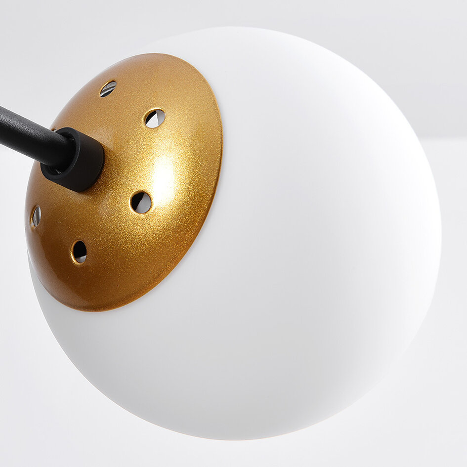 Designad pendellampa Damian med sex lampor och glaskulor