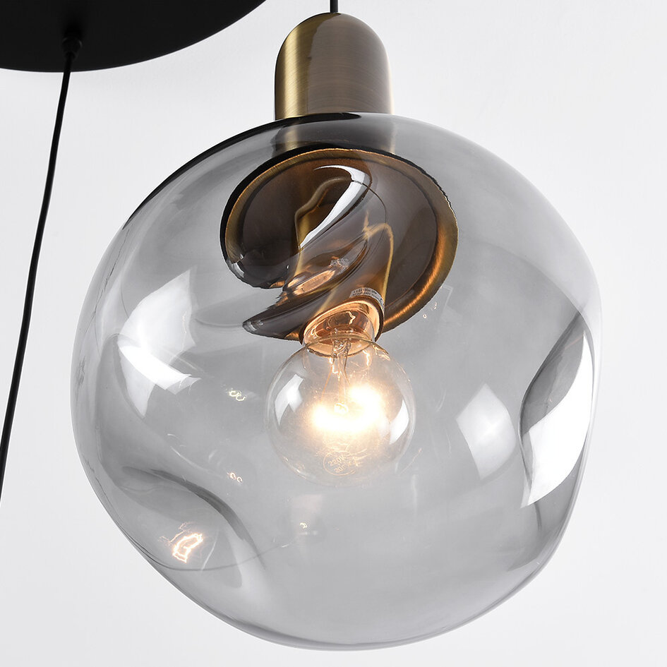 Pendellampa Kevin med fyra lampor och vågigt glas