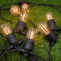 Solcellsdriven ljusslinga 25 meter med 50 eller 60 lampor med dubbelt filament, 30W solpanel
