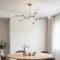 Pendellampa Melodie med sju lampor - guld med transparent glas