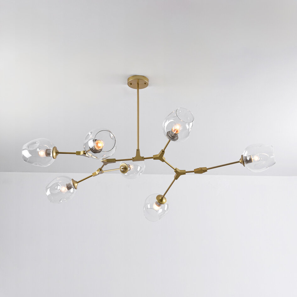 Pendellampa Melodie med sju lampor - guld med transparent glas