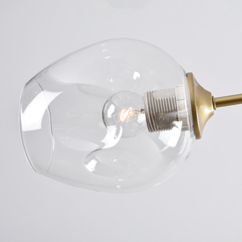 Pendellampa Melodie med sju lampor - guld med transparent glas