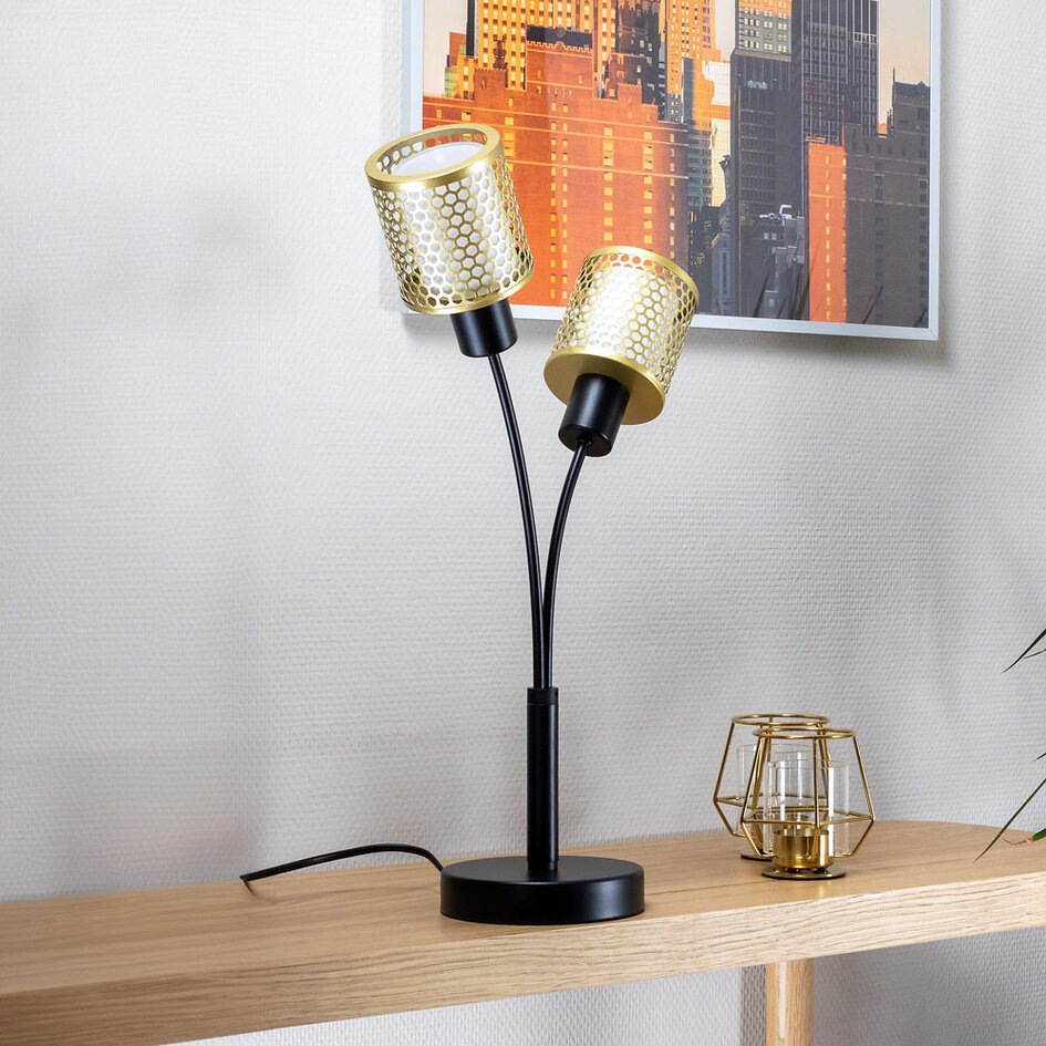 Lyxig bordslampa Altin med två lampor i svart med guldfärgade skärmar i honungsmönster