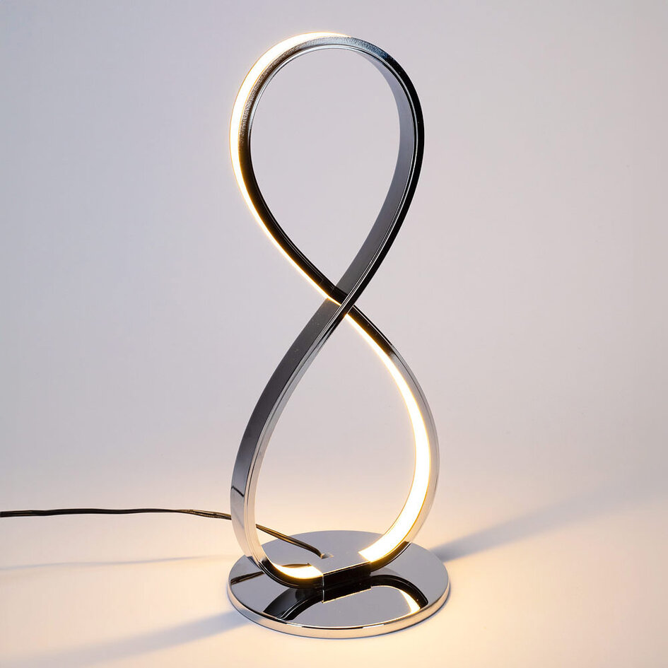 Designad bordslampa Infinita i krom med integrerade lysdioder