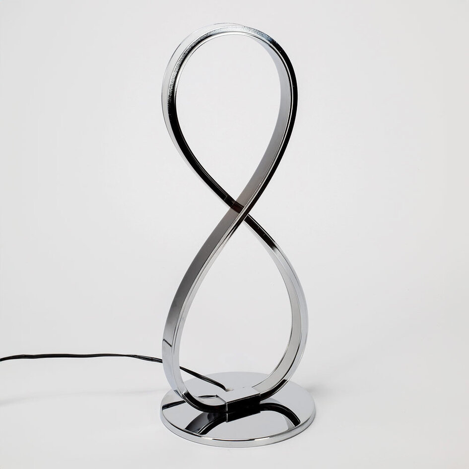Designad bordslampa Infinita i krom med integrerade lysdioder