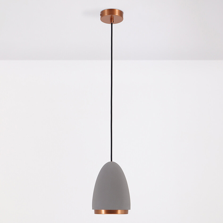 Modern pendellampa Feis med betong och kopparkant