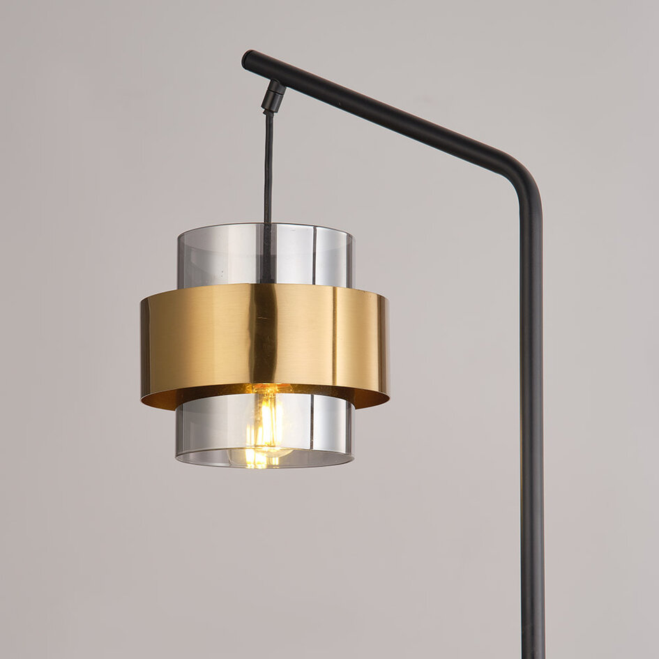 Designad golvlampa Kuld i svart med brons och rökgrått glas