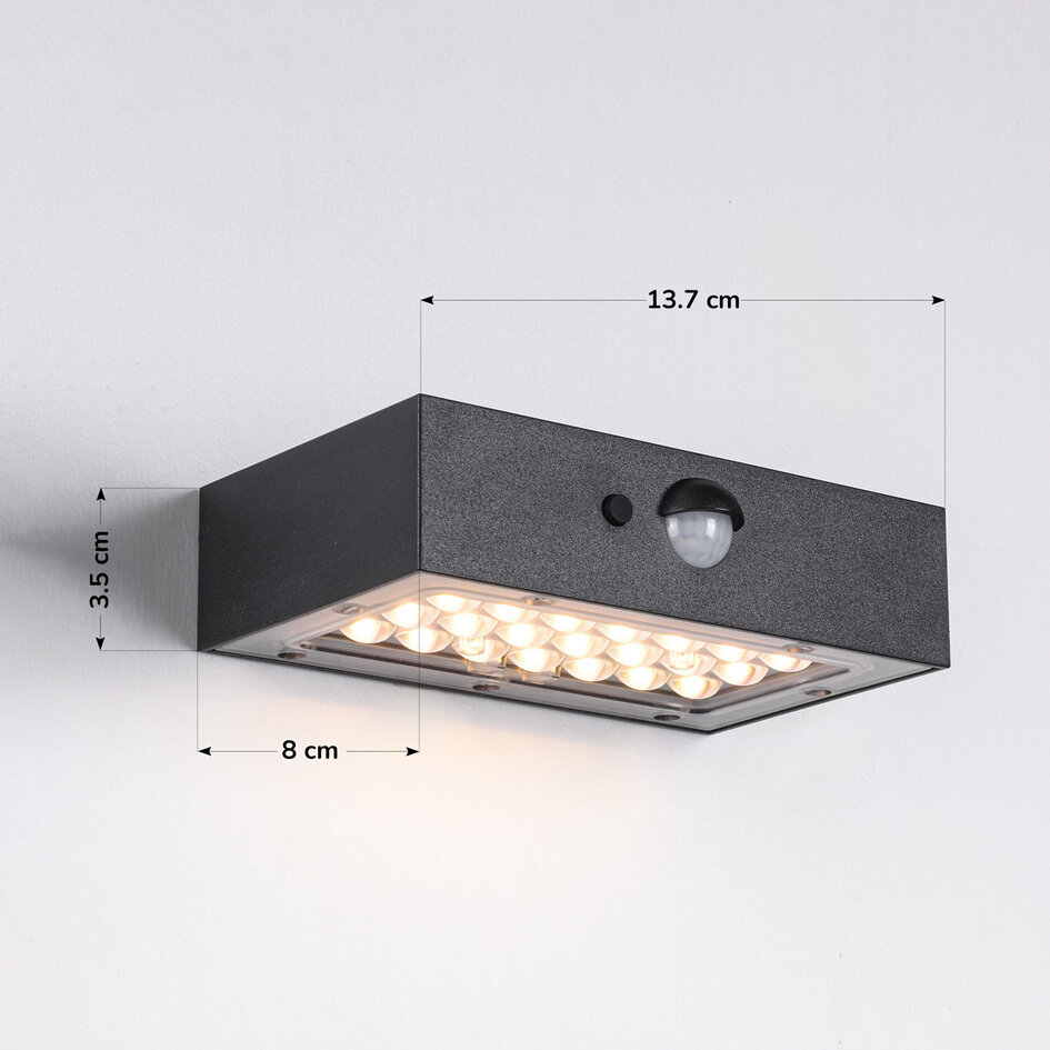 Svart solcellsvägglampa för utomhusbruk med sensor - Brock