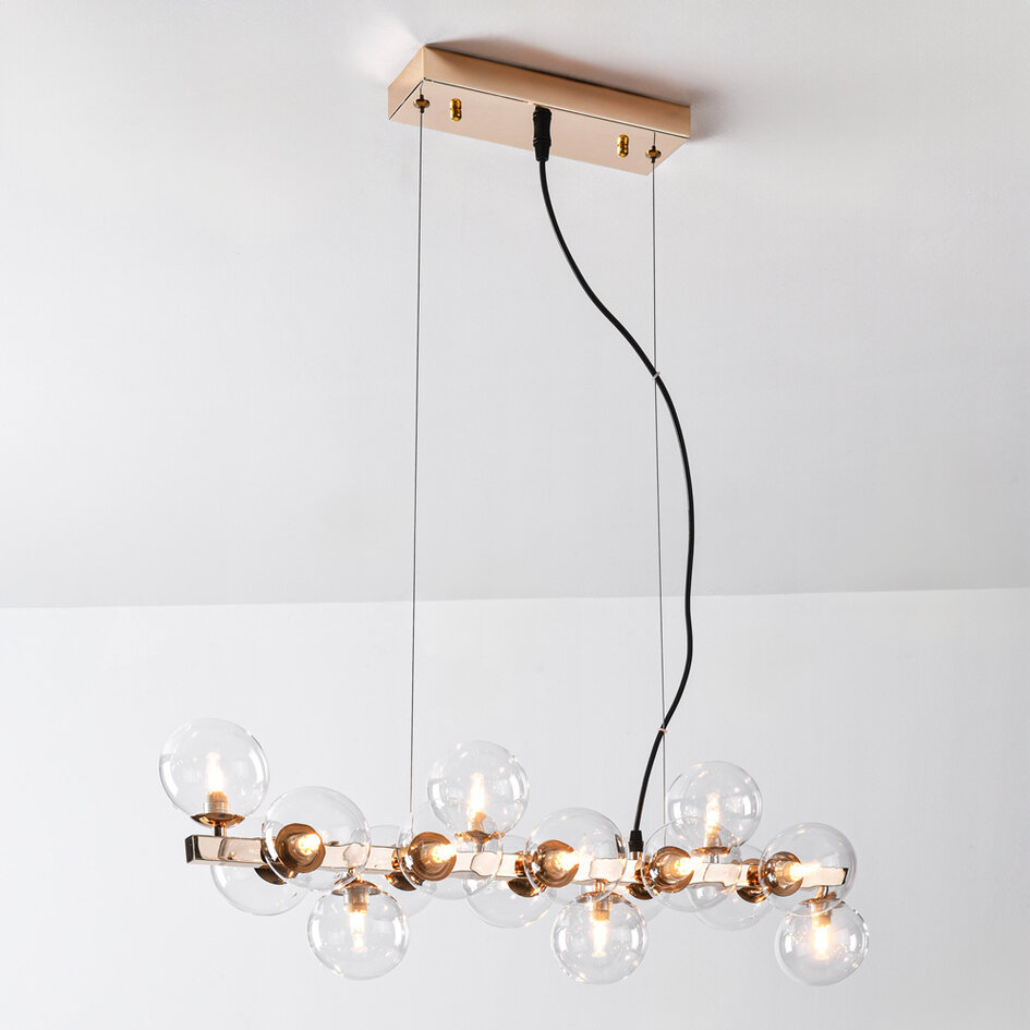 Pendellampa Sunita med sexton lampor - transparent glas med guld