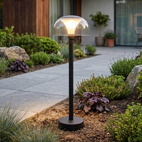 Svart stående utomhuslampa Joaz med transparent kupa - Utrustad med integrerad LED