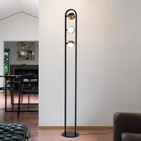 Golvlampa Terzo med tre vridbara spotlights i svart och guld