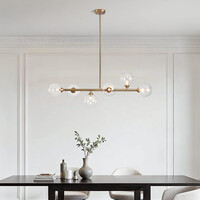 Pendellampa Aster med sex lampor - guld med transparenta glaskulor