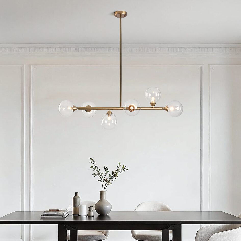 Pendellampa Aster med sex lampor - guld med transparenta glaskulor