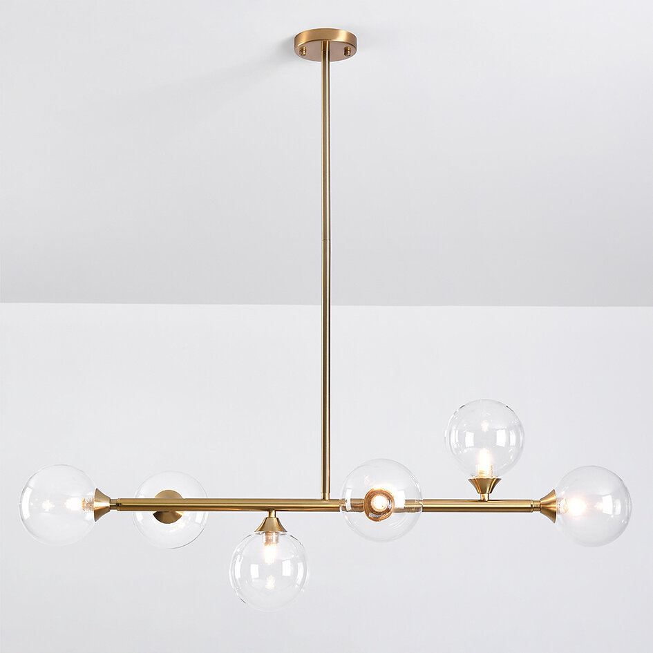 Pendellampa Aster med sex lampor - guld med transparenta glaskulor