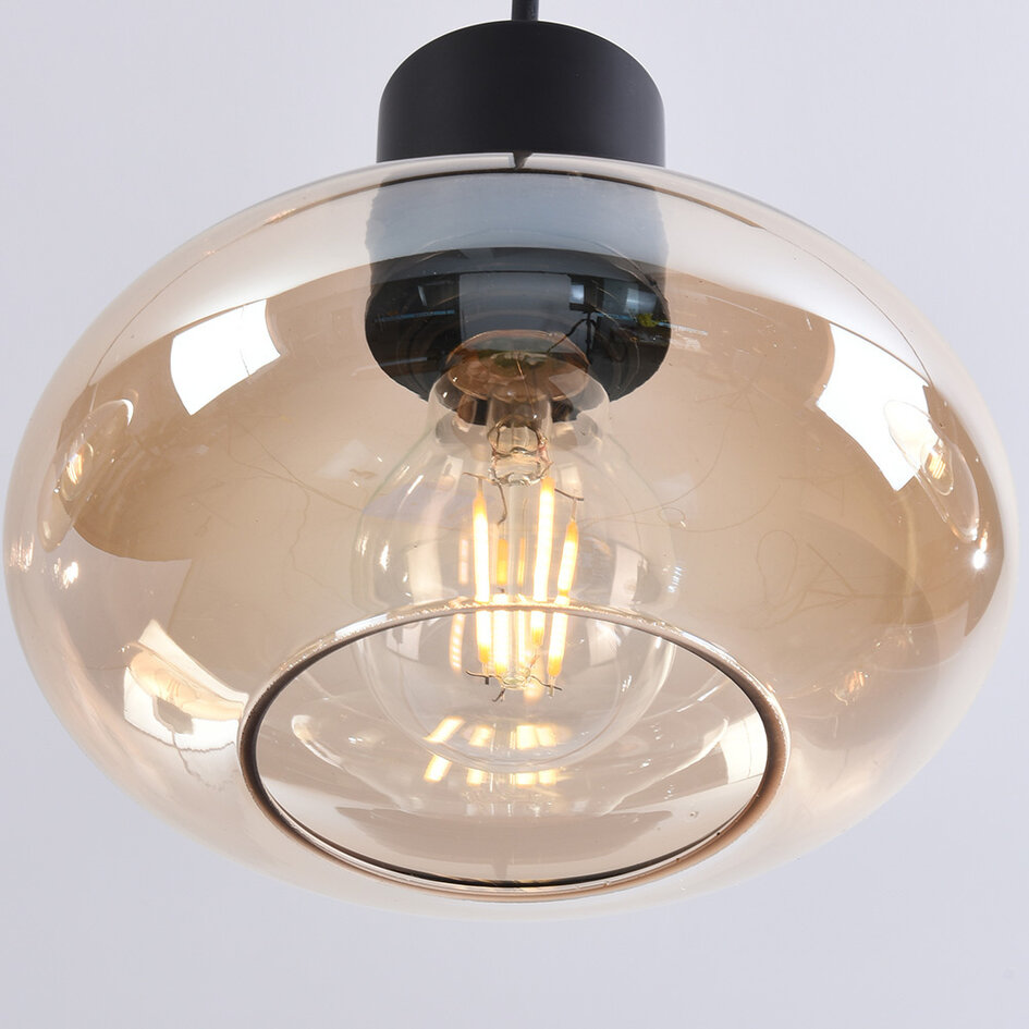 Modern pendellampa Vida med tre lampor - amberfärgat glas och svart