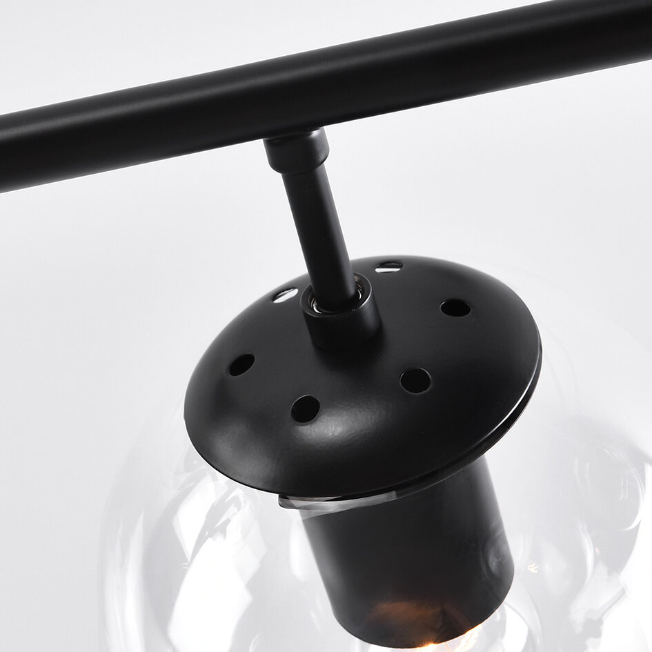 Pendellampa Hepta med sju lampor - transparent glas och svart