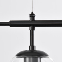 Pendellampa Hepta med sju lampor - transparent glas och svart