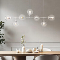 Pendellampa Hepta med sju lampor - transparent glas och vitt