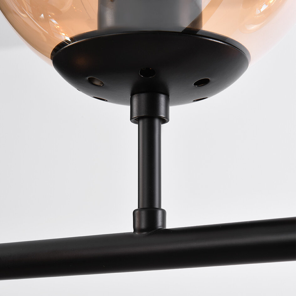 Pendellampa Hepta med sju lampor - amberfärgat glas och svart