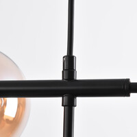 Pendellampa Hepta med sju lampor - amberfärgat glas och svart