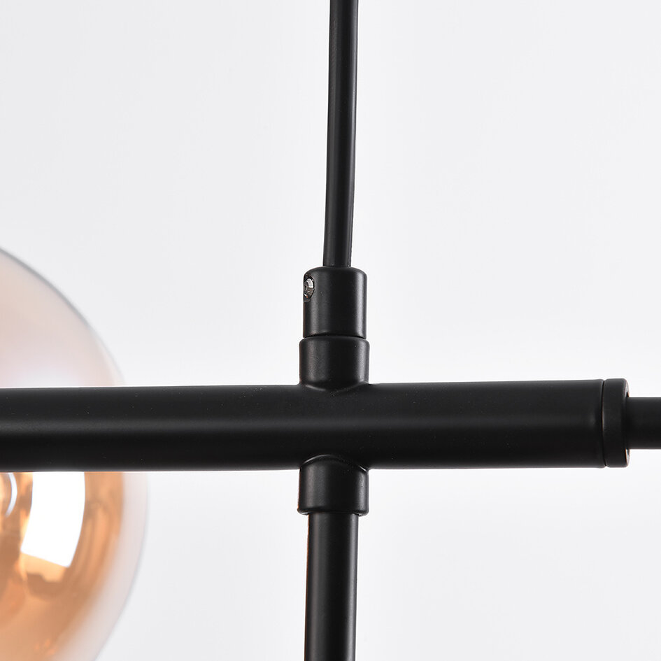 Pendellampa Hepta med sju lampor - amberfärgat glas och svart