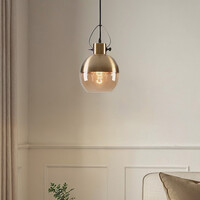 Pendellampa Laure - amberfärgat glas, klotformad art déco