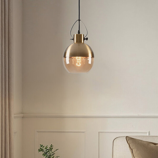 Pendellampa Laure - amberfärgat glas, klotformad art déco