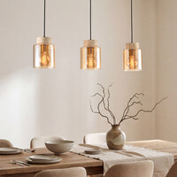 Pendellampa Naki med tre lampor i travertin (natursten) och amberglas
