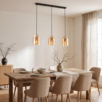 Pendellampa Naki med tre lampor i travertin (natursten) och amberglas