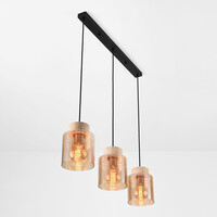 Pendellampa Naki med tre lampor i travertin (natursten) och amberglas