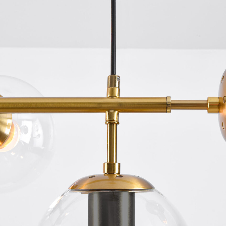 Pendellampa Hepta med sju lampor - transparent glas
