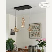 Retro pendellampa Maracas med fyra lampor - svart och amberfärgat glas