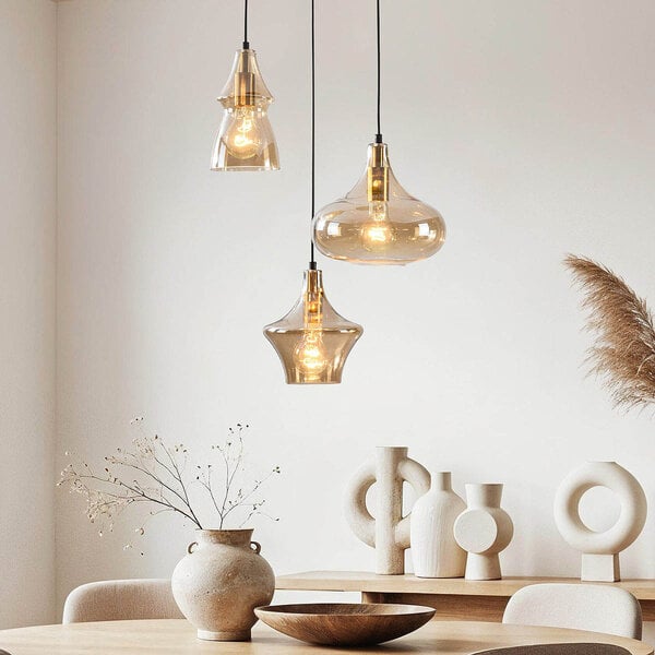 Designad pendellampa Calypso med tre lampor och skärmar i amberfärgat glas
