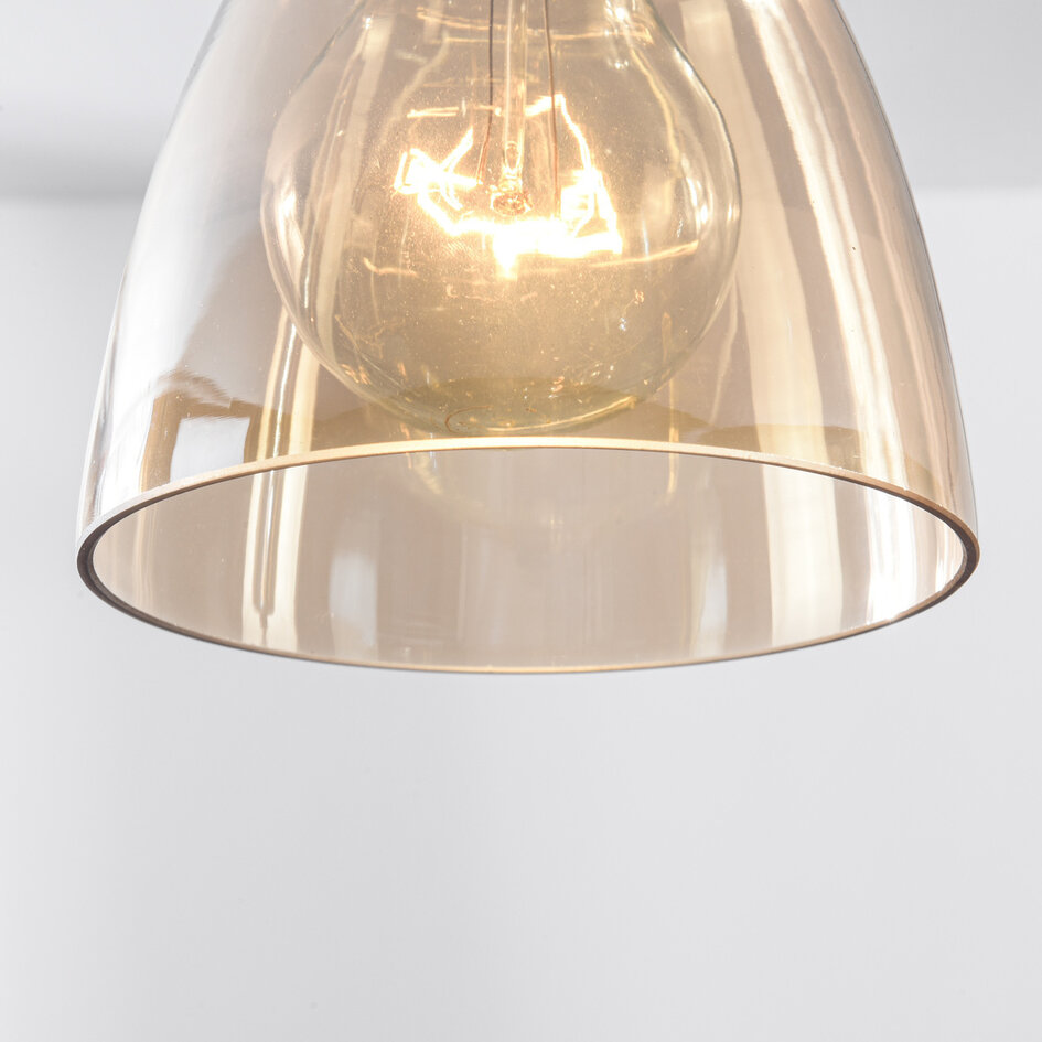 Designad pendellampa Calypso med tre lampor och skärmar i amberfärgat glas