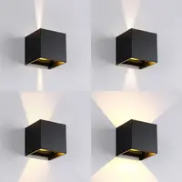 Modern utomhusvägglampa Daniel svart med rörelse- och skymningssensor