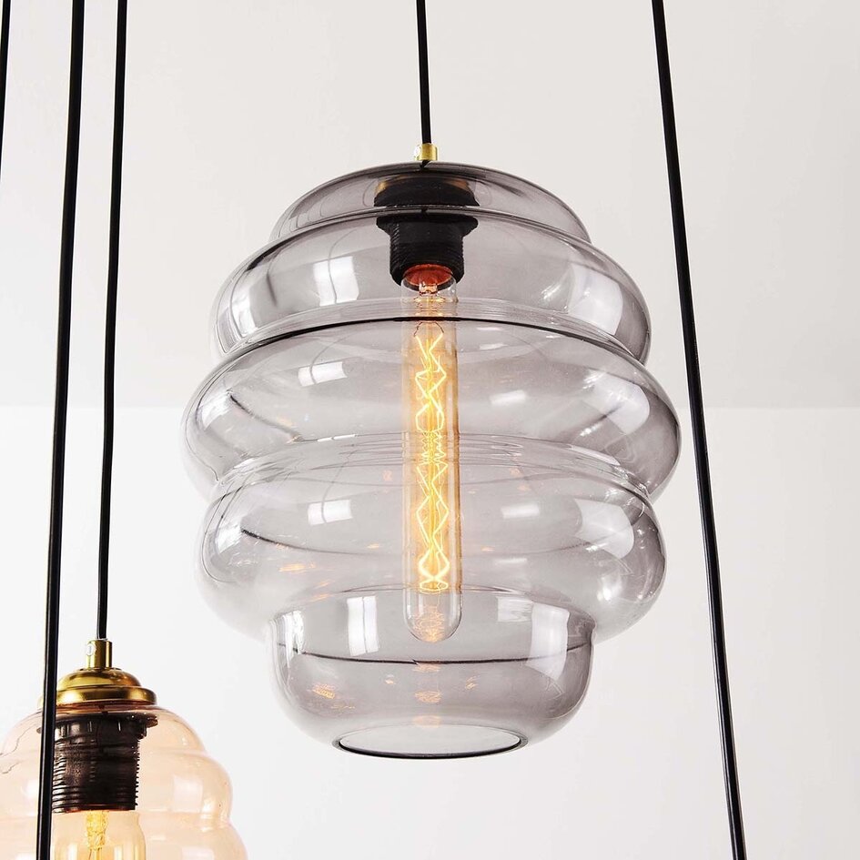 Designad pendellampa Zavari med 9 glaskulor i amber, rökfärgat och blått