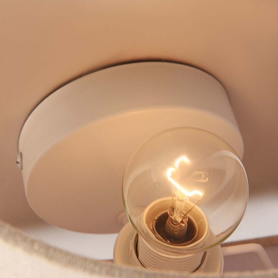 Vägglampa Tova med linneskärm i benvitt