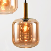 Pendellampa Pendu med tre lampor, guld och amberglas