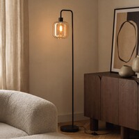 Golvlampa Piedi i svart med amberglas