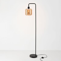 Golvlampa Piedi i svart med amberglas