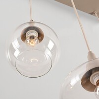 Pendellampa Loic med sex lampor, transparent glas i sandbeige