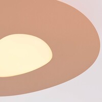 Vägglampa Felora i varm beige med organisk form