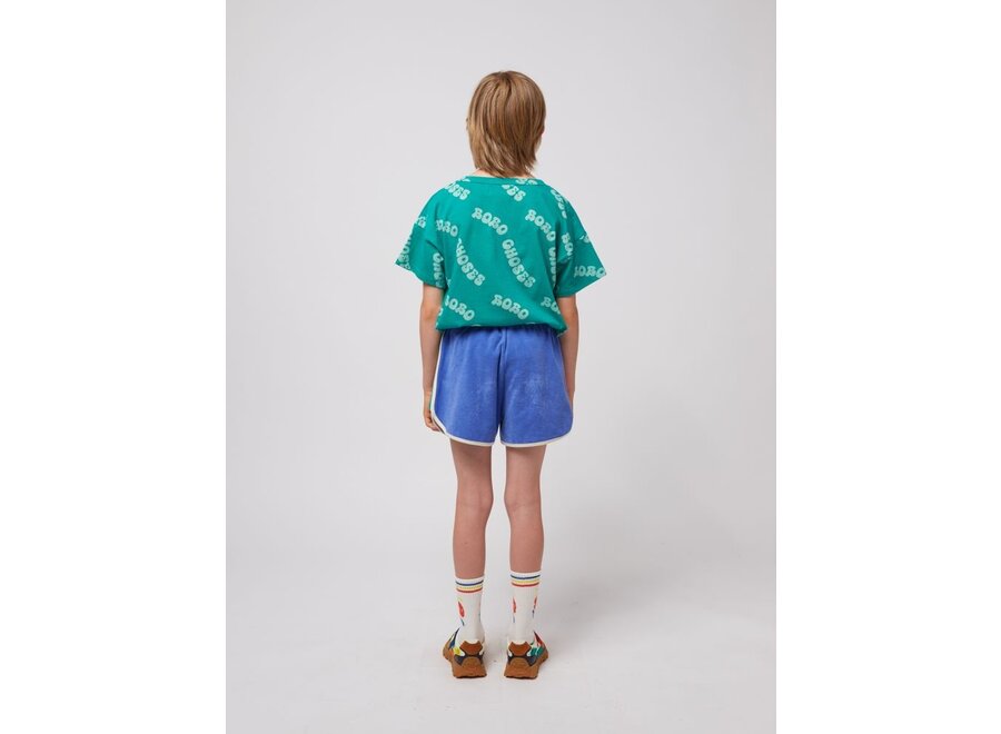 Bobo Choses | Smiling color block terry cloth shorts Blue