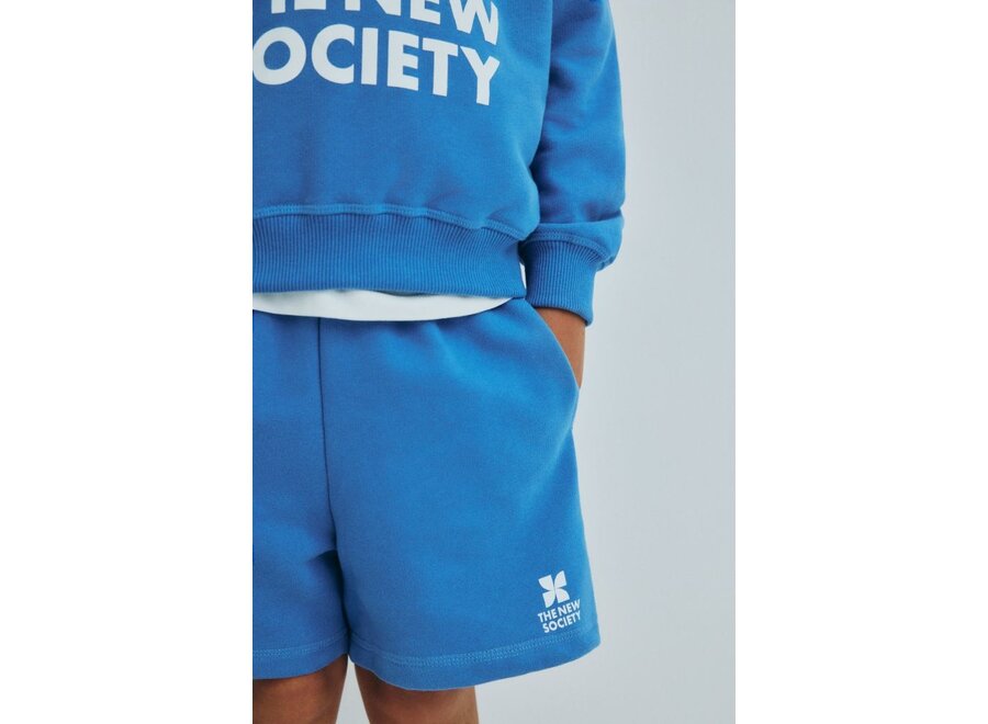 The New Society | TNS Logo Short Iris Whisper