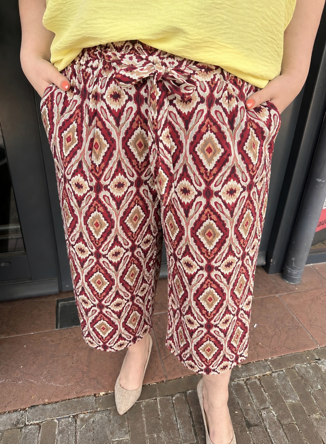 CARMIKASI CULOTTE BELT PANTS AOP Brick Red/Abstract s