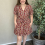 CARANTONIA MIKASI S/S SHORT DRESS AOP Brick Red/Abstract s
