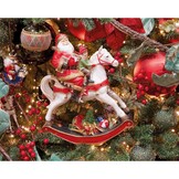 Kerstman met kind op hobbelpaard | polyresin | 18cm