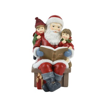 Kerstman met leesboek | polyresin | 18cm